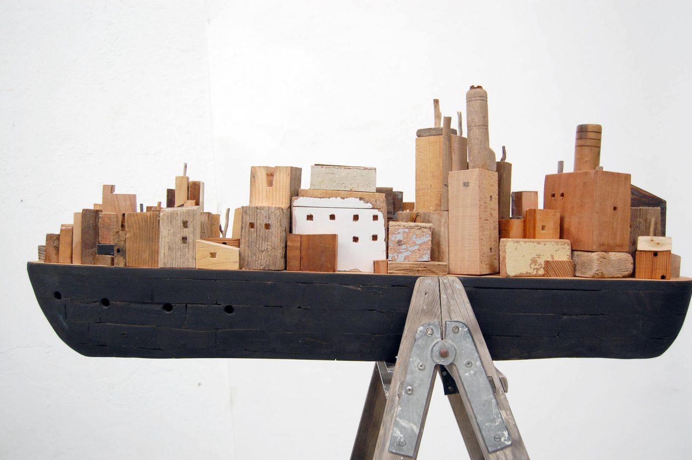 Drifting continent collage city in peace reclaimed wood cornwall